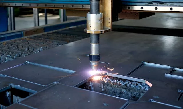 Plasma cutter cutting metal