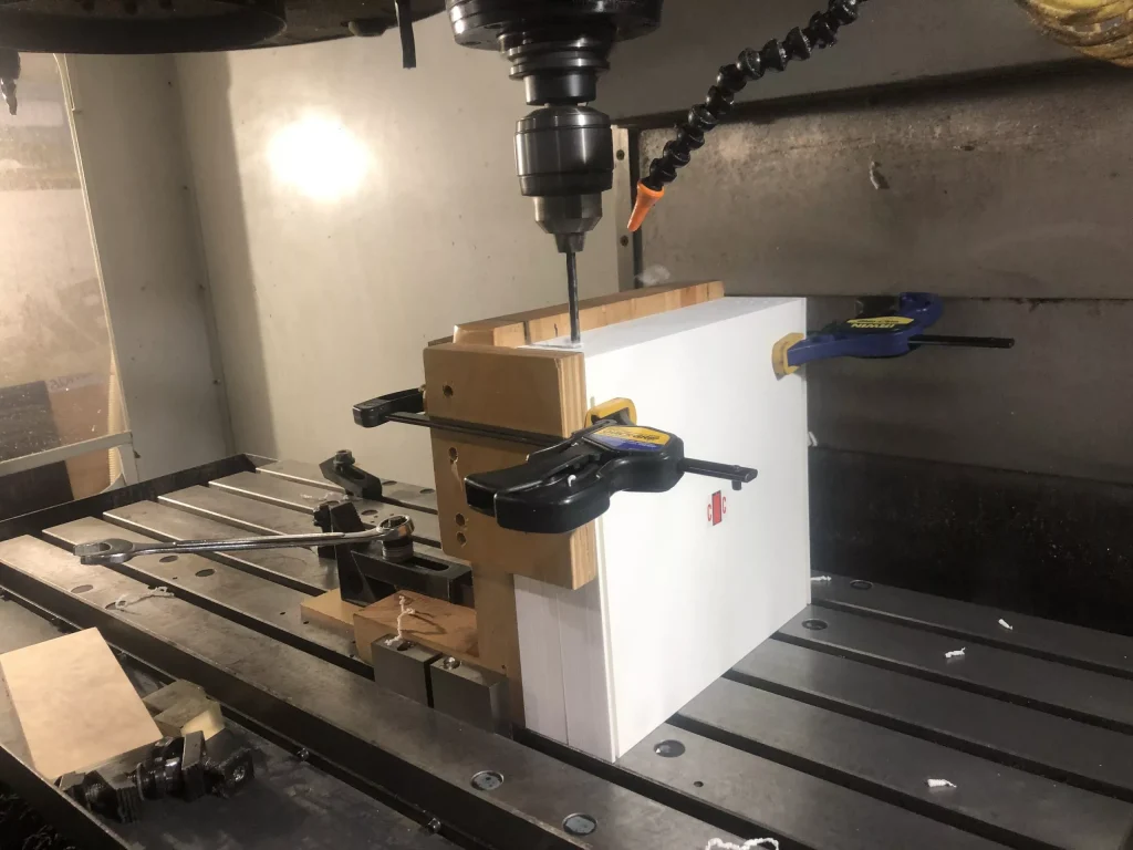 Plastic CNC Machining 4 CNC drilling of fpvc plastic material parts
