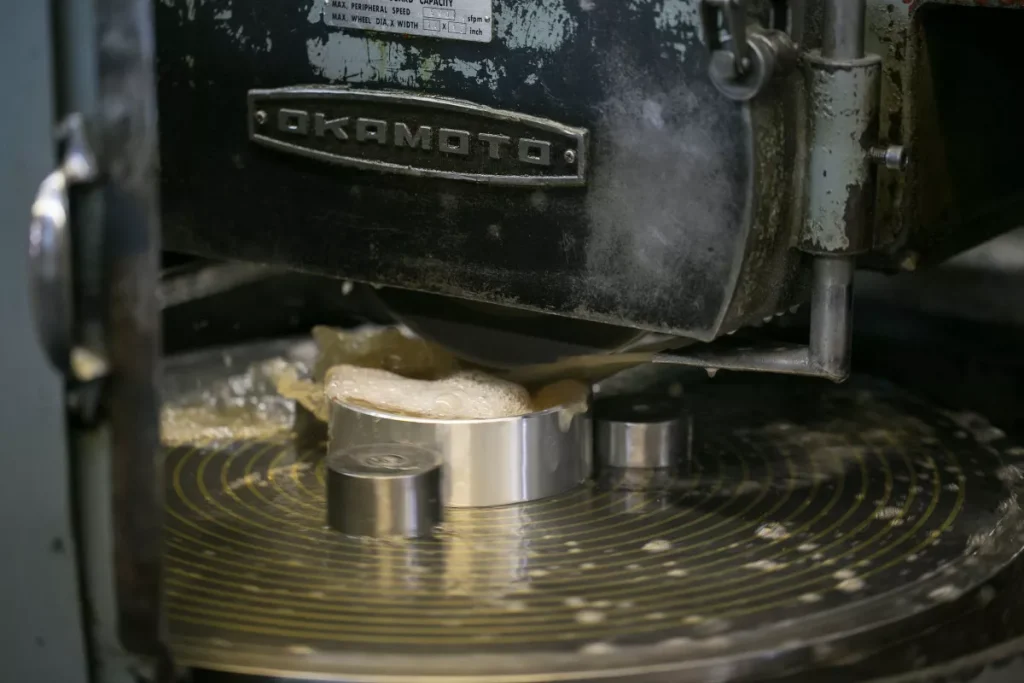 Rotary surface grinder machining aluminum alloy parts