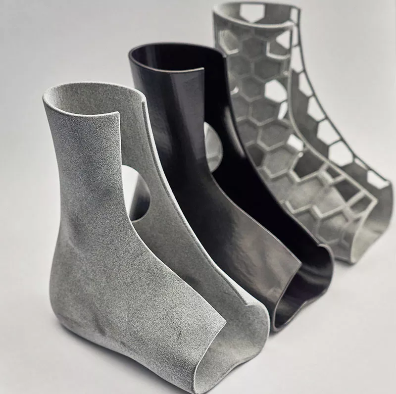 Steam smoothing of plastic rapid prototype parts of different materials