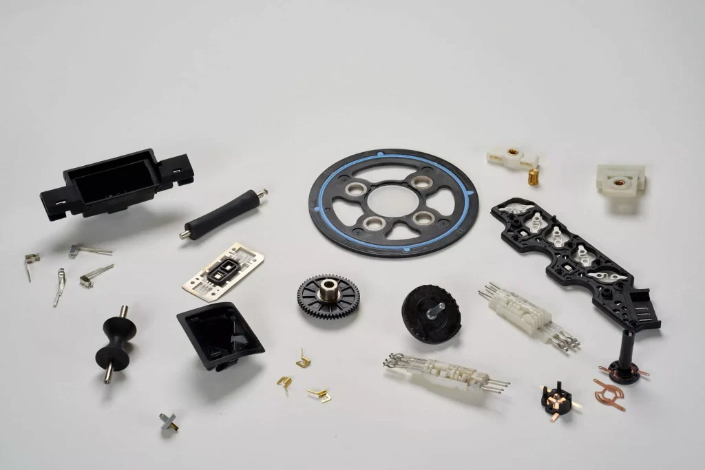Insert molding process to customize a variety of plastic parts