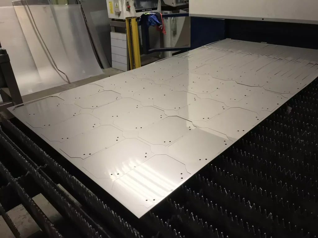 Rapid laser cutting of aluminum sheet parts